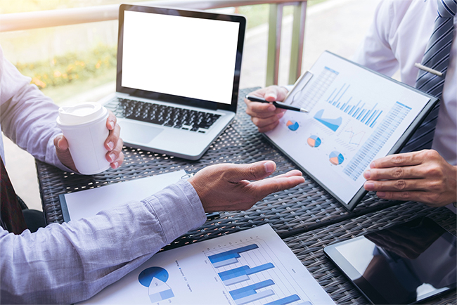 Co working conference Business team meeting present investor executive colleagues discussing new plan financial graph data on outdoors office table with laptop and tablet Finance accounting investment.